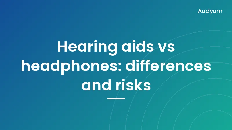 Comparison between a behind-the-ear hearing aid and wireless earbuds on a table